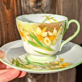Hand-painted daffodil bone china cup and saucer set