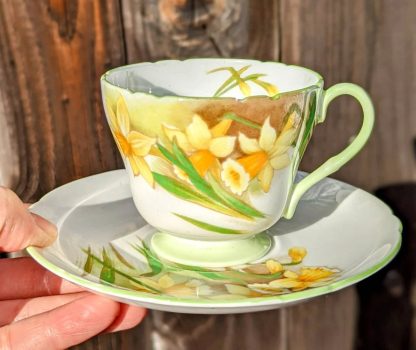 Hand-painted daffodil bone china cup and saucer set