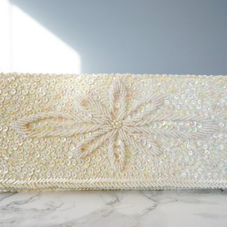 Handmade sequin embroidered snowflake clutch