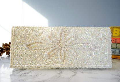 Handmade sequin embroidered snowflake clutch