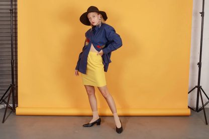 Bright yellow high-waisted miniskirt