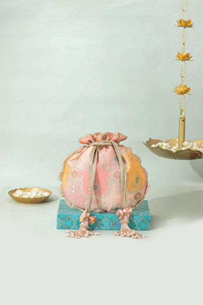 Pink and orange contrast embroidered drawstring bag