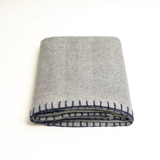 Light grey contrast navy blue stitching throw blanket
