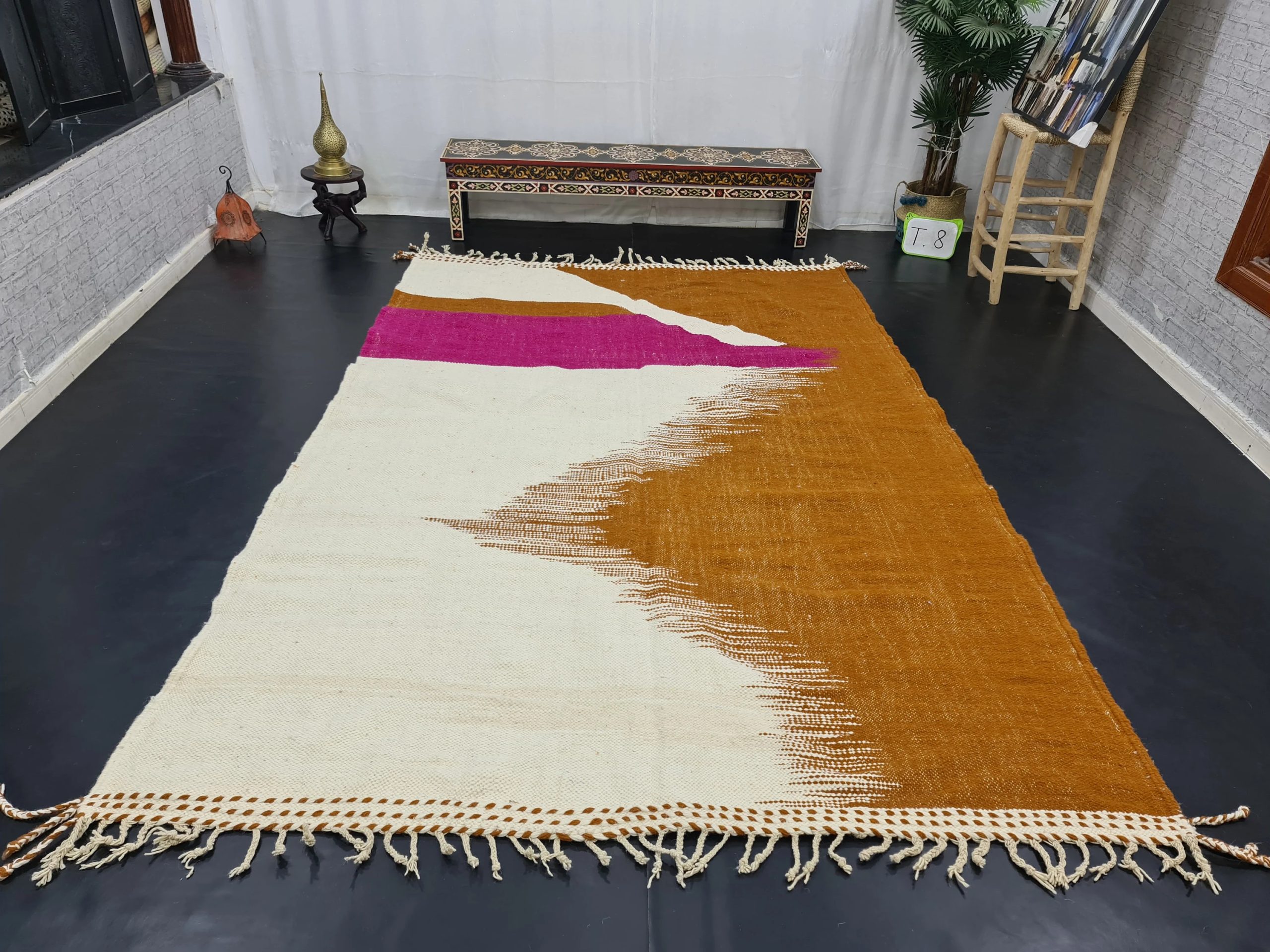 Sunset contrasting geometric tassel rug