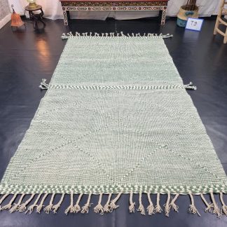 Mint green handmade tassel rug