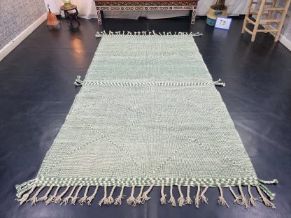 Mint green handmade tassel rug