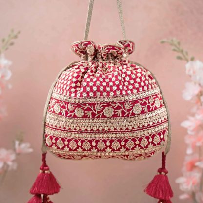 Red and gold embroidered tassel drawstring bag