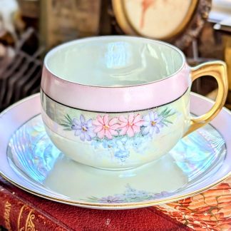Colorful hand-painted floral cup and saucer set
