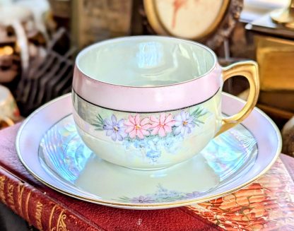 Colorful hand-painted floral cup and saucer set