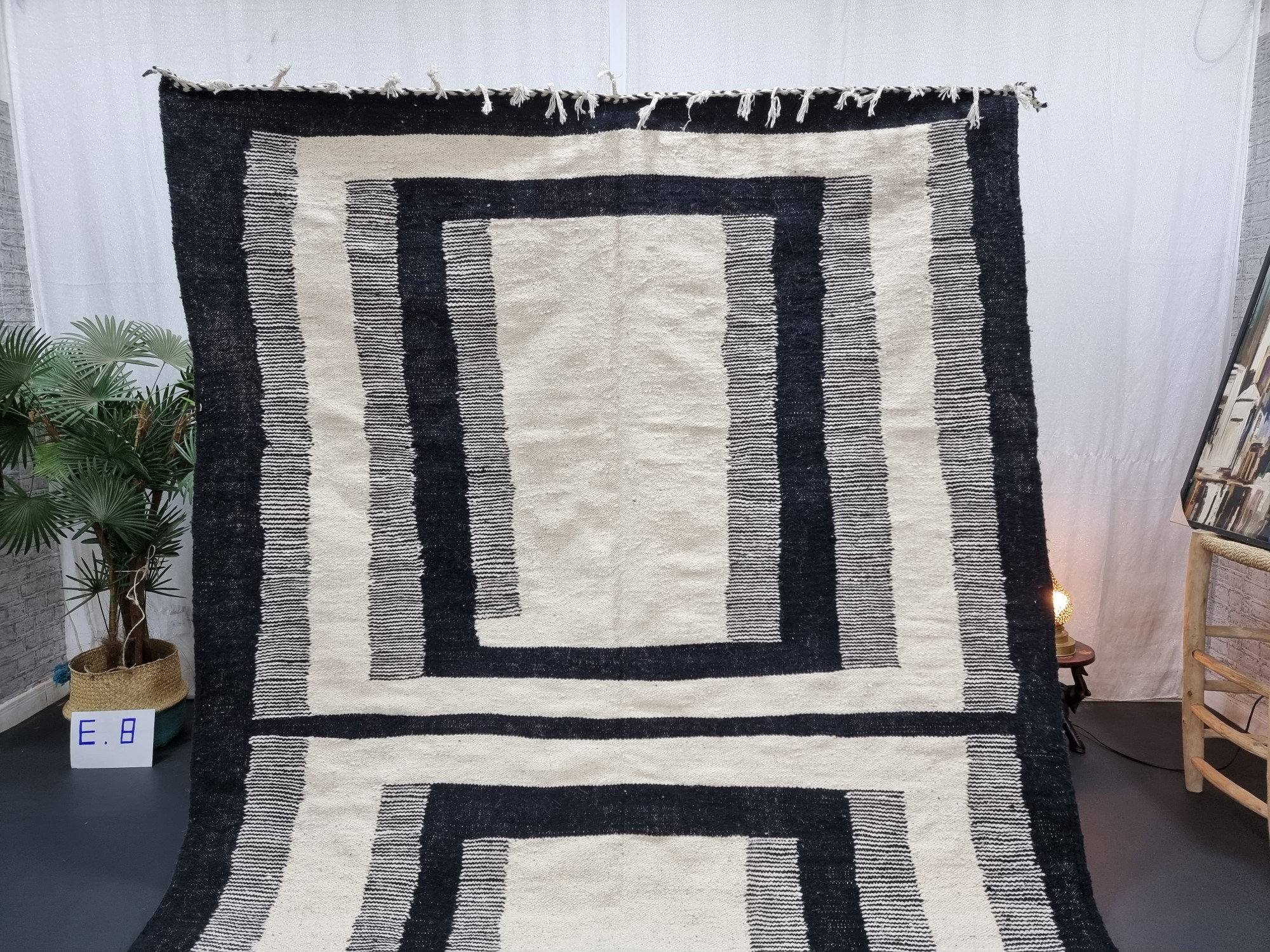 Handmade black and white geometric tassel rug - Image 9