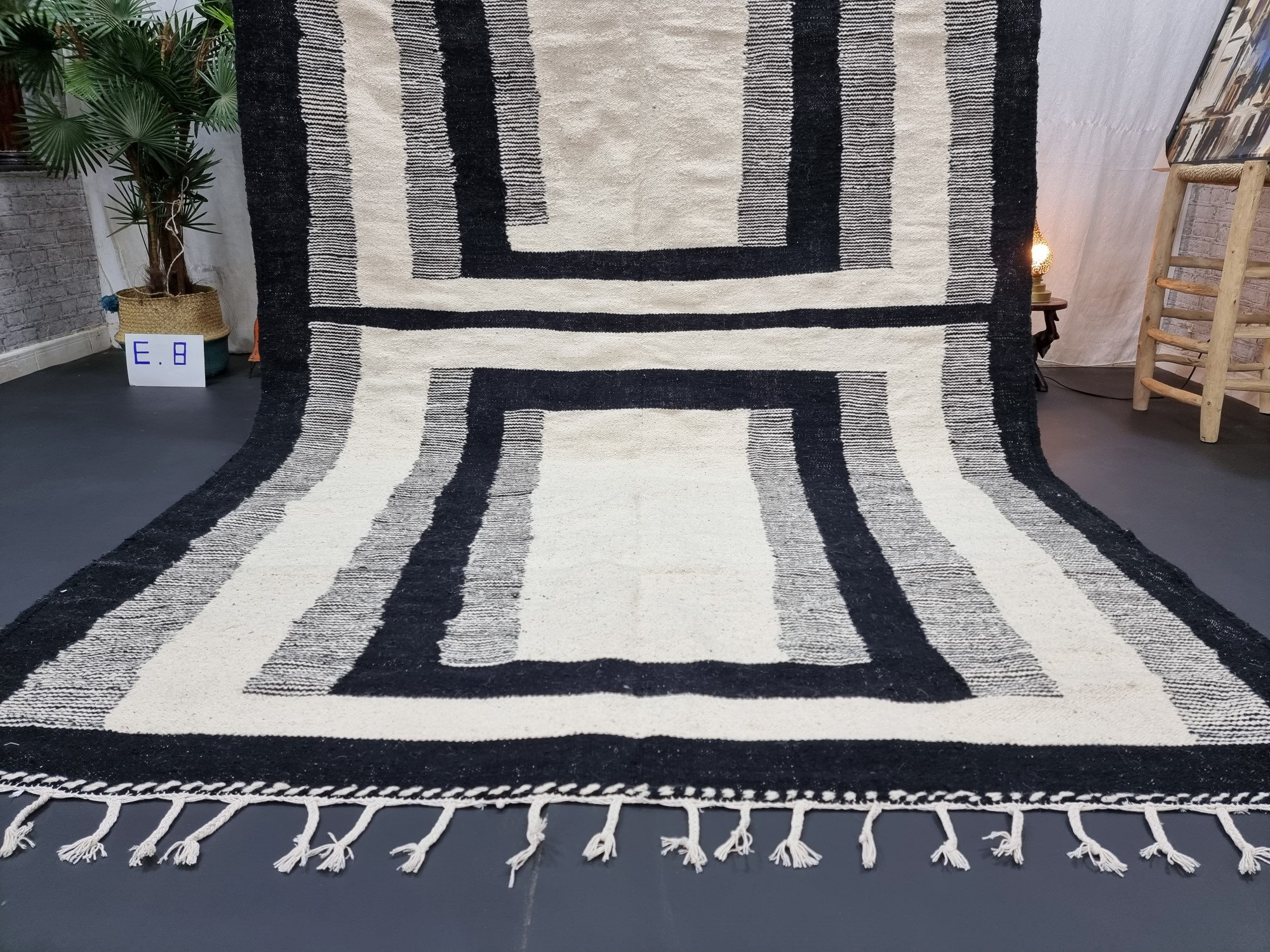 Handmade black and white geometric tassel rug - Image 8