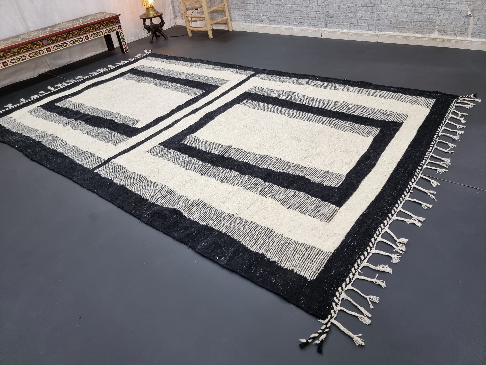 Handmade black and white geometric tassel rug - Image 7
