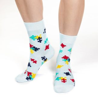 Colorful puzzle themed fun socks