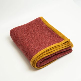 Red, brown and turmeric knitted blanket
