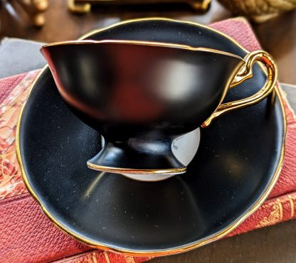 Black-glazed blue-flowered gilt cup and saucer set - Image 5