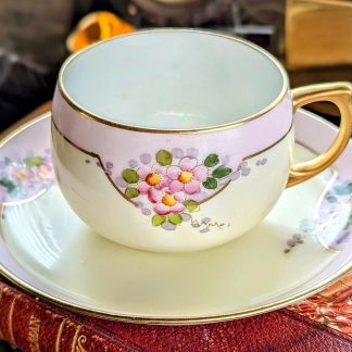 Lilac flower cluster gilt cup and saucer set