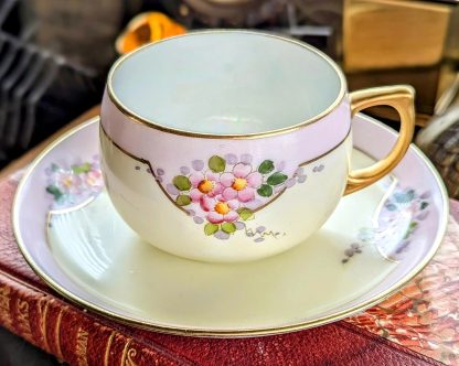 Lilac flower cluster gilt cup and saucer set