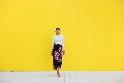 Black high-waisted maxi skirt with colorful floral print