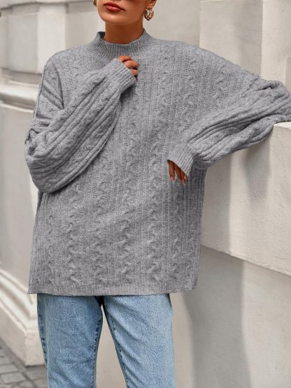 Grey cable-knit sweater