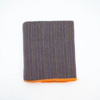 Dark brown contrasting hem blended throw blanket