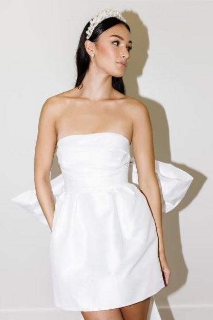 White satin open back large bow dress with train - Image 2