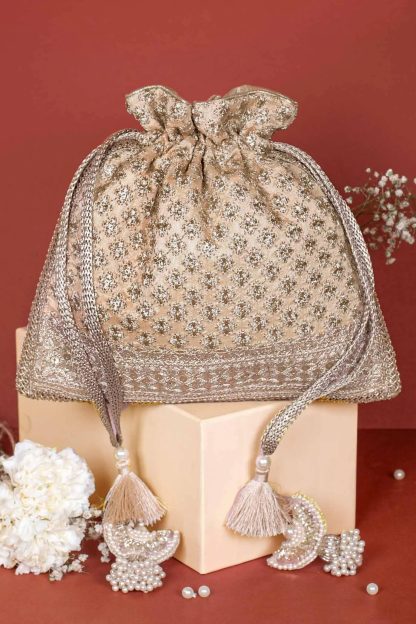 Champagne gold embroidered tassel drawstring bag