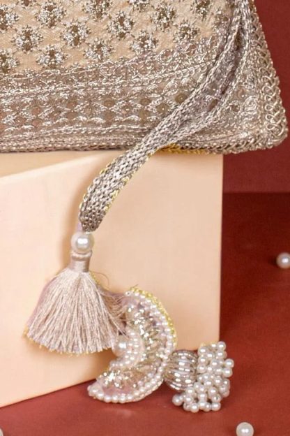 Champagne gold embroidered tassel drawstring bag - Image 2