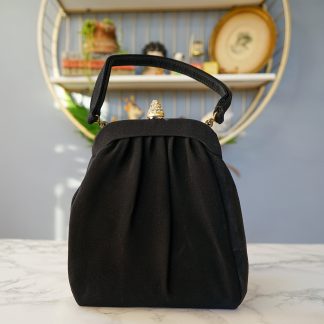 Vintage diamond lock pleated handbag
