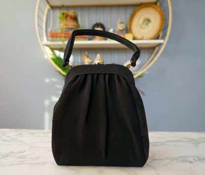 Vintage diamond lock pleated handbag