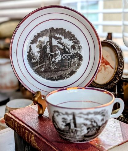 Narrative Hand-Painted Ceramic Cup and Saucer Set