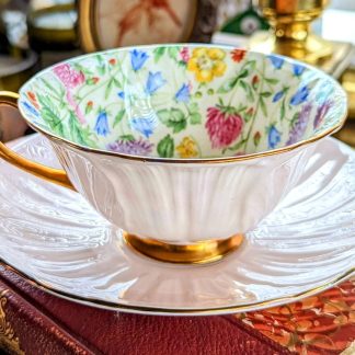 Embossed gilt bone china cup and saucer set