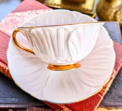 Embossed gilt bone china cup and saucer set - Image 3
