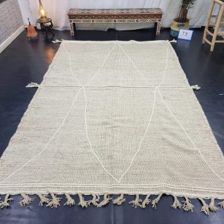 Natural beige geometric tassel rug