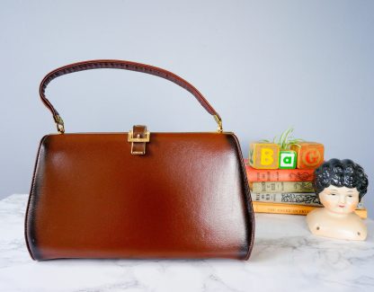 Vintage brown oil leather metal buckle handbag