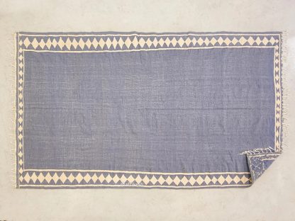 Handmade blue and white geometric tassel carpet - Image 11