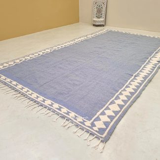 Handmade blue and white geometric tassel carpet