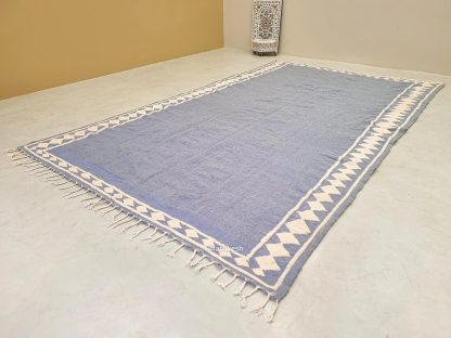 Handmade blue and white geometric tassel carpet