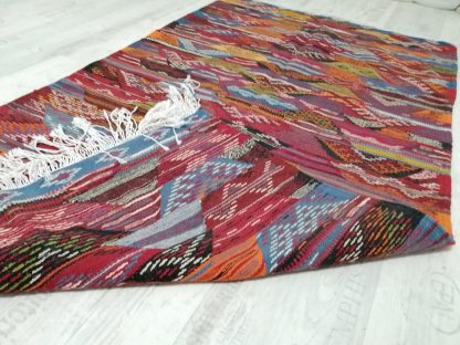 Handmade colorful geometric woven tassel rug