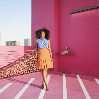 Vibrant orange high waist pleated midi skirt