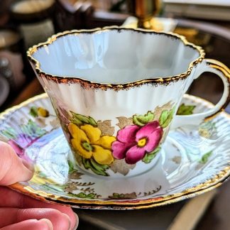 Gilded flower cluster bone china cup and saucer set