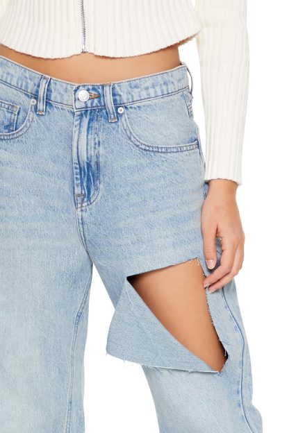 Deconstructed ripped flared jeans - Image 6