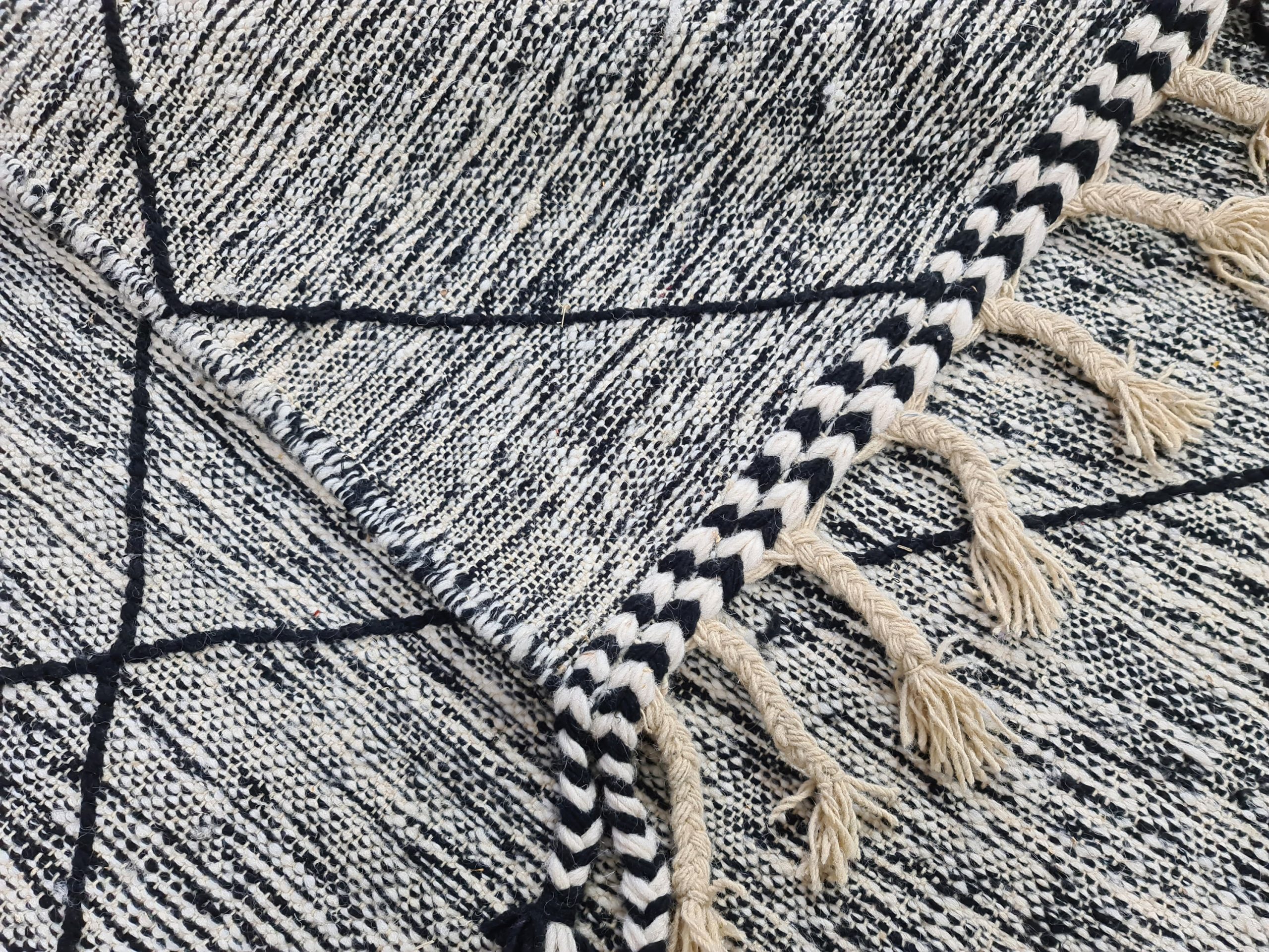 Handmade black and white diamond tassel carpet - Image 2