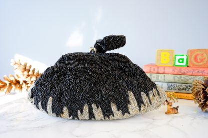 Vintage black and gold beaded tassel clutch