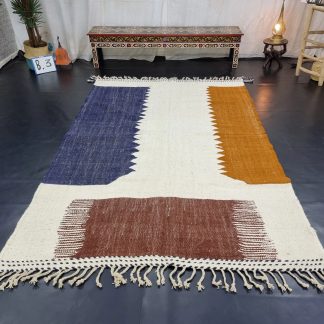Handmade earth-tone contrast tassel rug