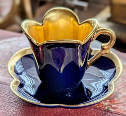 Sapphire blue gilt petal cup and saucer set