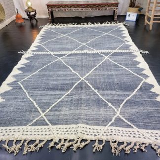 Handmade blue and white diamond tassel carpet
