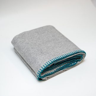 Light grey contrast hand-stitched throw blanket