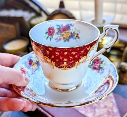 Hand-painted floral cup and saucer set - Image 7