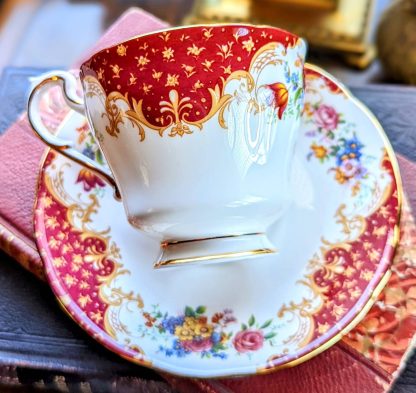 Hand-painted floral cup and saucer set - Image 4
