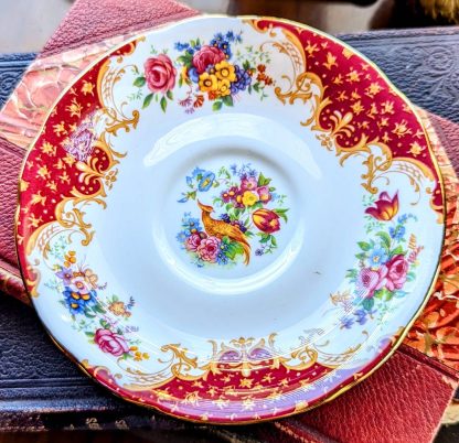 Hand-painted floral cup and saucer set - Image 2